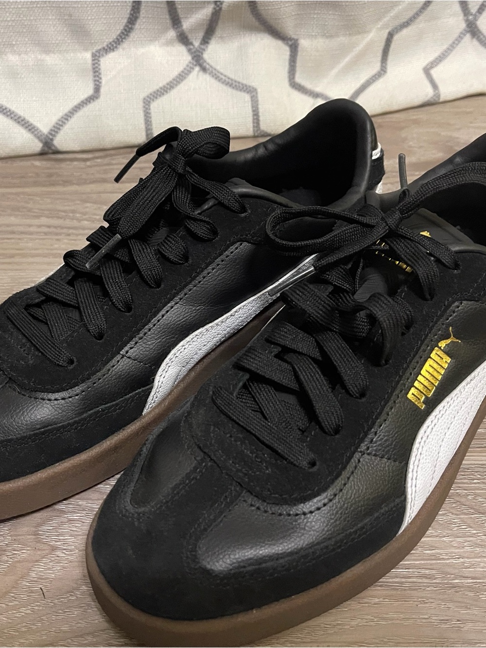 Puma Black Leather Sneakers with White Stripe and Gum Sole